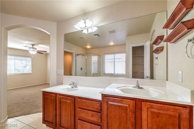 bathroom with vanity, tile patterned flooring, plenty of natural light, and ceiling fan