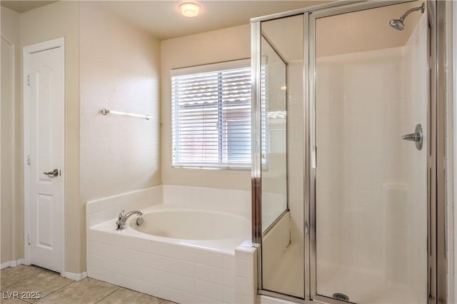 bathroom with plus walk in shower and tile patterned floors