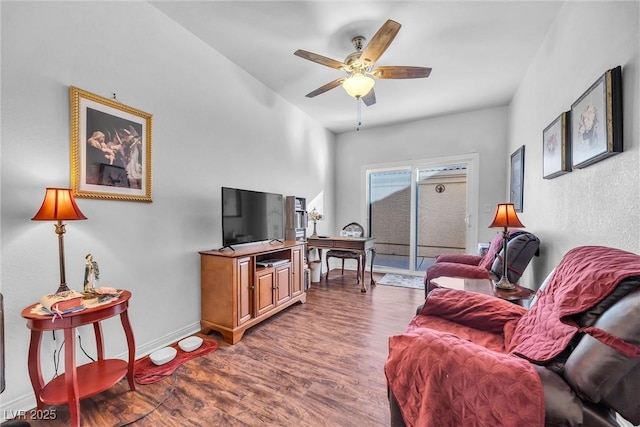 living room featuring hardwood / wood-style flooring and ceiling fan