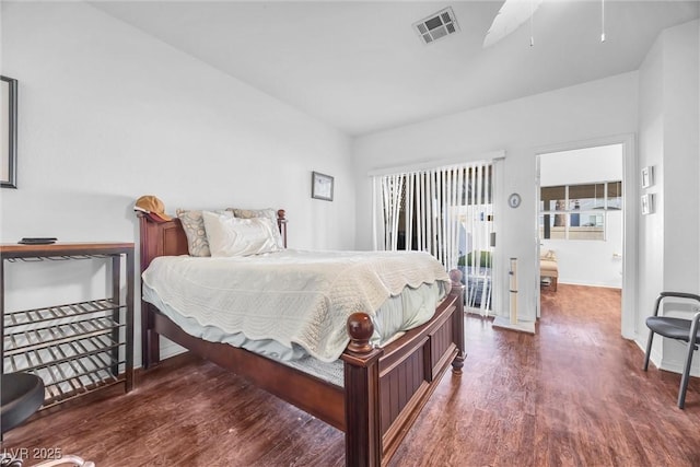 bedroom featuring dark hardwood / wood-style flooring