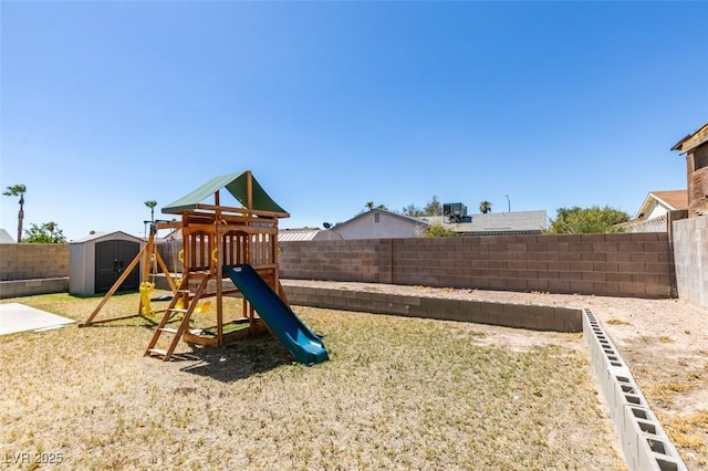 view of playground featuring a storage unit