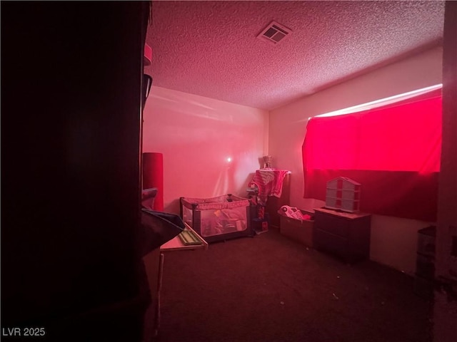 1900 W Carey Ave, North Las Vegas, NV 89032 - bedroom featuring carpet and a textured ceiling