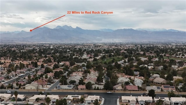 aerial view featuring a residential view and a mountain view