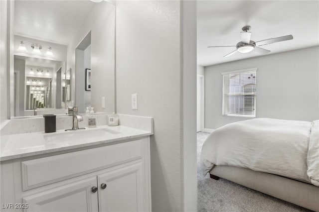 bathroom with vanity and a ceiling fan