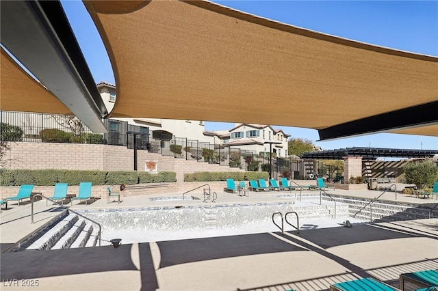 surrounding community featuring a patio area, a pool, and fence