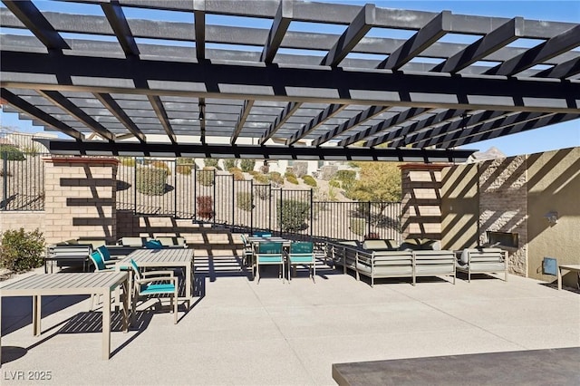 view of patio featuring an outdoor living space and a pergola