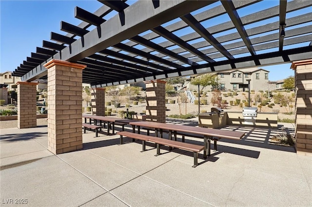 exterior space featuring a residential view, a patio, and a pergola