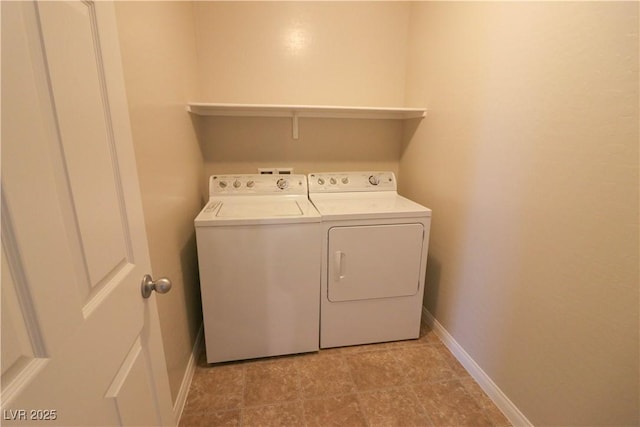 laundry area with independent washer and dryer