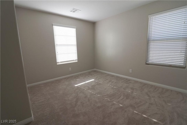 view of carpeted spare room