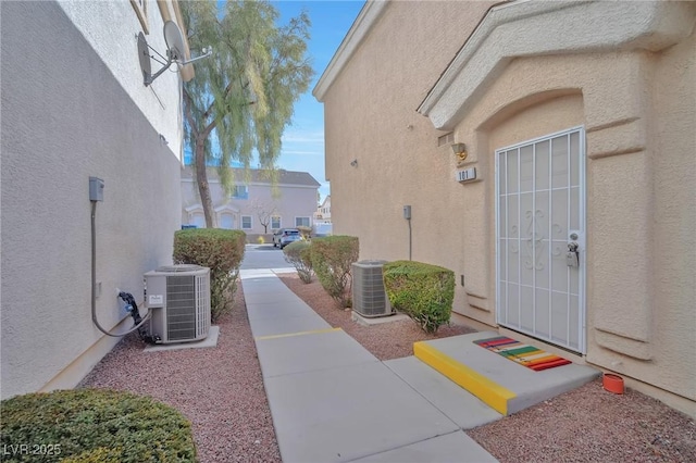 property entrance featuring central air condition unit