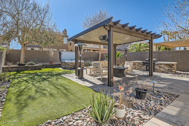 view of yard with a patio area, a fenced backyard, and a fire pit