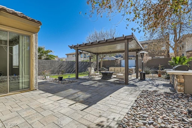 view of patio featuring a fire pit and a fenced backyard