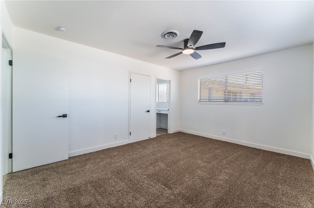 unfurnished bedroom featuring carpet and ceiling fan