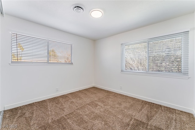 view of carpeted spare room