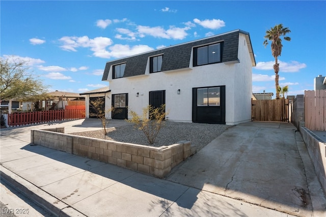 view of front of home with a patio area