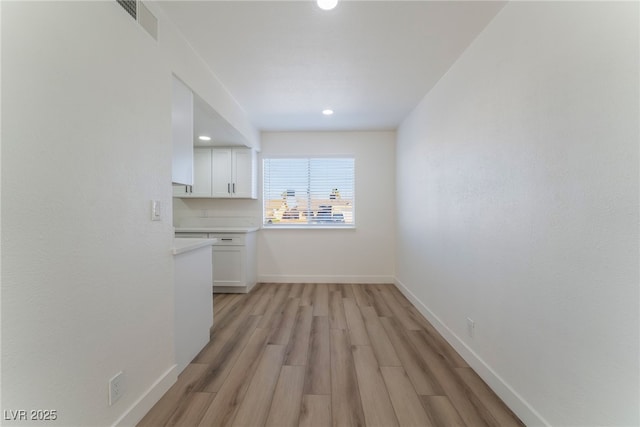 interior space with light hardwood / wood-style floors