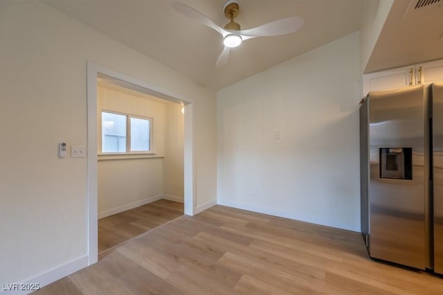 interior space featuring ceiling fan and light wood-type flooring