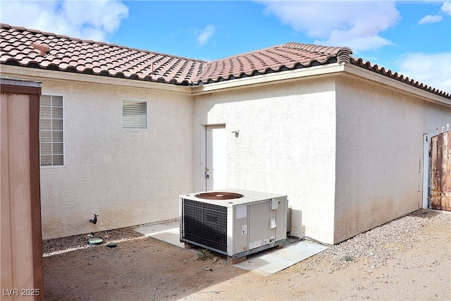 view of property exterior featuring cooling unit