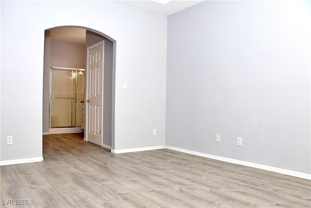 unfurnished room featuring light hardwood / wood-style flooring