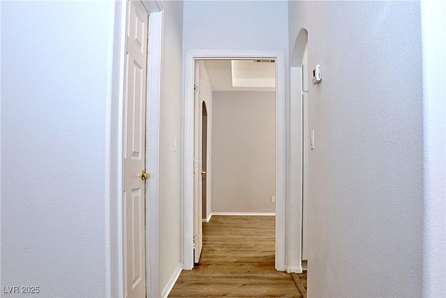 corridor featuring light wood-type flooring