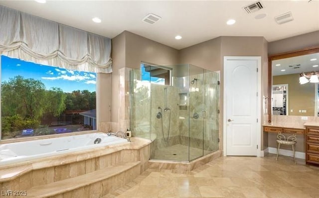 bathroom with independent shower and bath and vanity