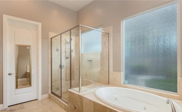 bathroom with shower with separate bathtub and tile patterned floors