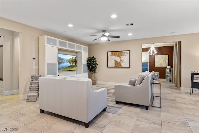 living room featuring ceiling fan