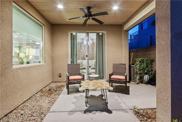 view of patio / terrace featuring ceiling fan