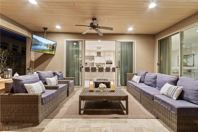 view of patio / terrace featuring an outdoor living space and ceiling fan