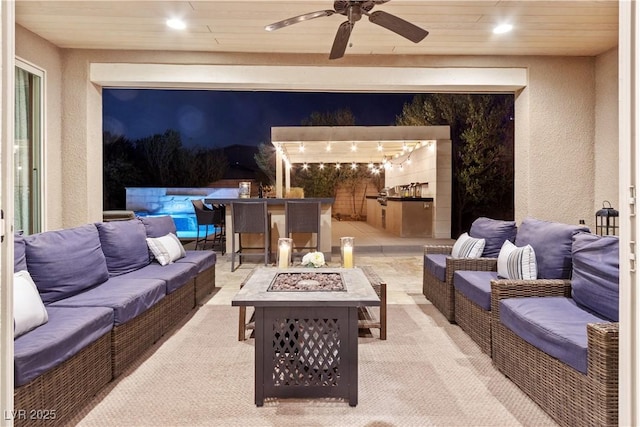 interior space with wooden ceiling and ceiling fan