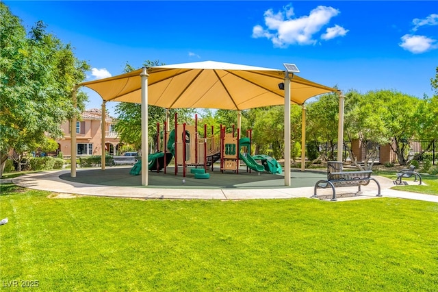 view of jungle gym with a lawn