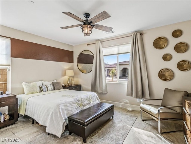 bedroom featuring ceiling fan