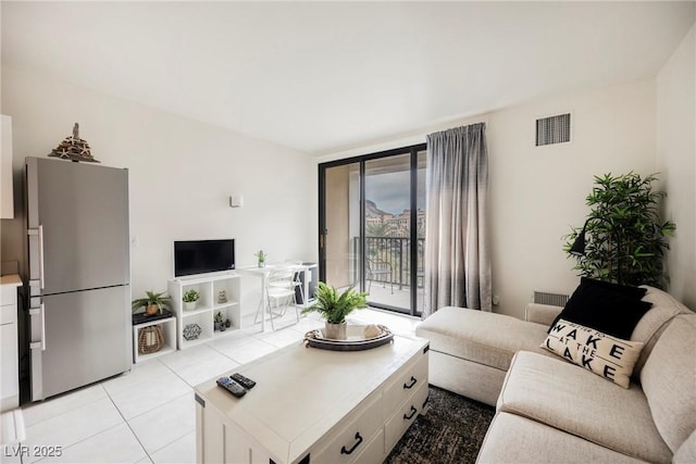 living room featuring light tile patterned floors