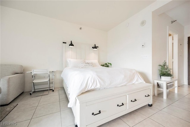 bedroom featuring light tile patterned floors