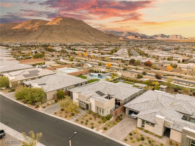 aerial view at dusk with a mountain view