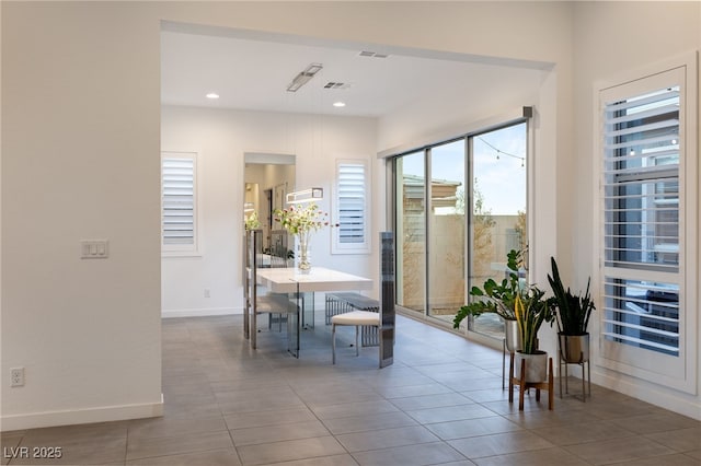 dining area with tile patterned floors