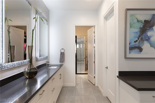 bathroom with vanity and tile patterned floors