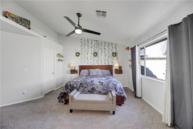 bedroom with lofted ceiling, light colored carpet, and ceiling fan