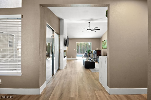 hallway featuring light wood-type flooring