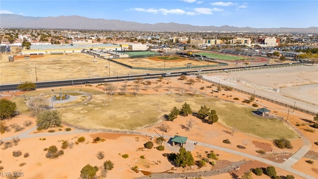 birds eye view of property with a mountain view