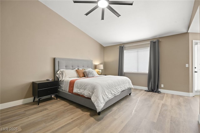 bedroom featuring vaulted ceiling, ceiling fan, and light hardwood / wood-style floors