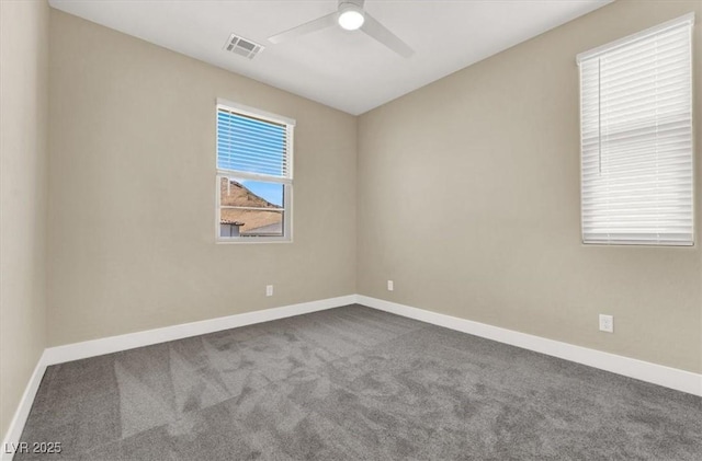 carpeted empty room with ceiling fan