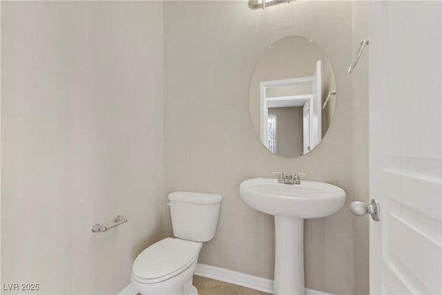 bathroom with sink and toilet