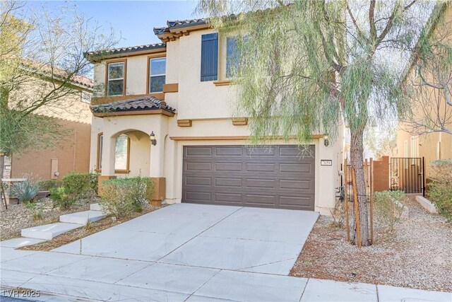 7659 Dewy Falls Ave, Las Vegas, NV 89179 - mediterranean / spanish house featuring a tile roof, stucco siding, an attached garage, driveway, and fence