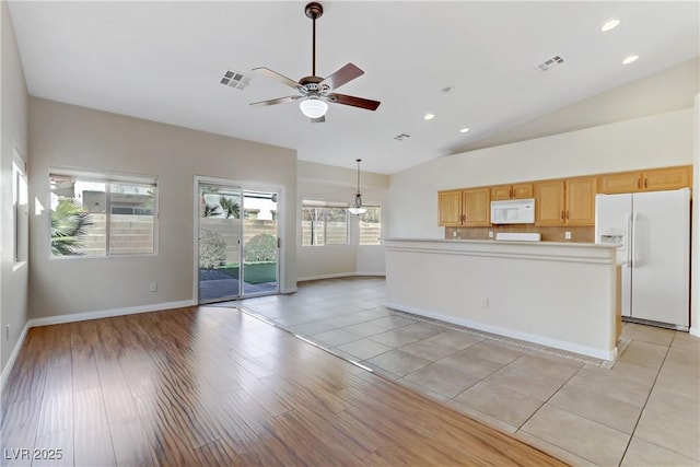 unfurnished living room featuring high vaulted ceiling, ceiling fan, and light hardwood / wood-style flooring