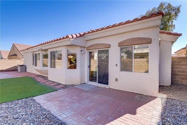 rear view of property with a patio area