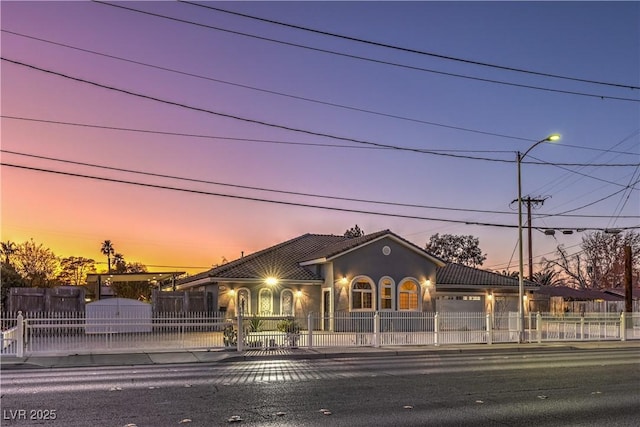 view of front of home with a garage