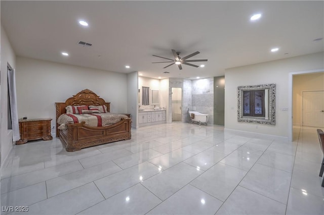 bedroom featuring connected bathroom and ceiling fan