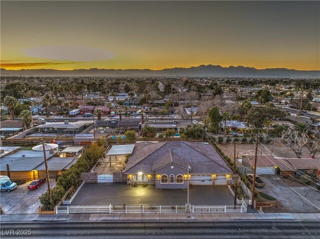 aerial view at dusk with a mountain view