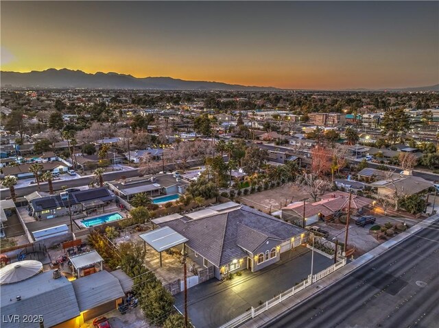 aerial view at dusk with a mountain view